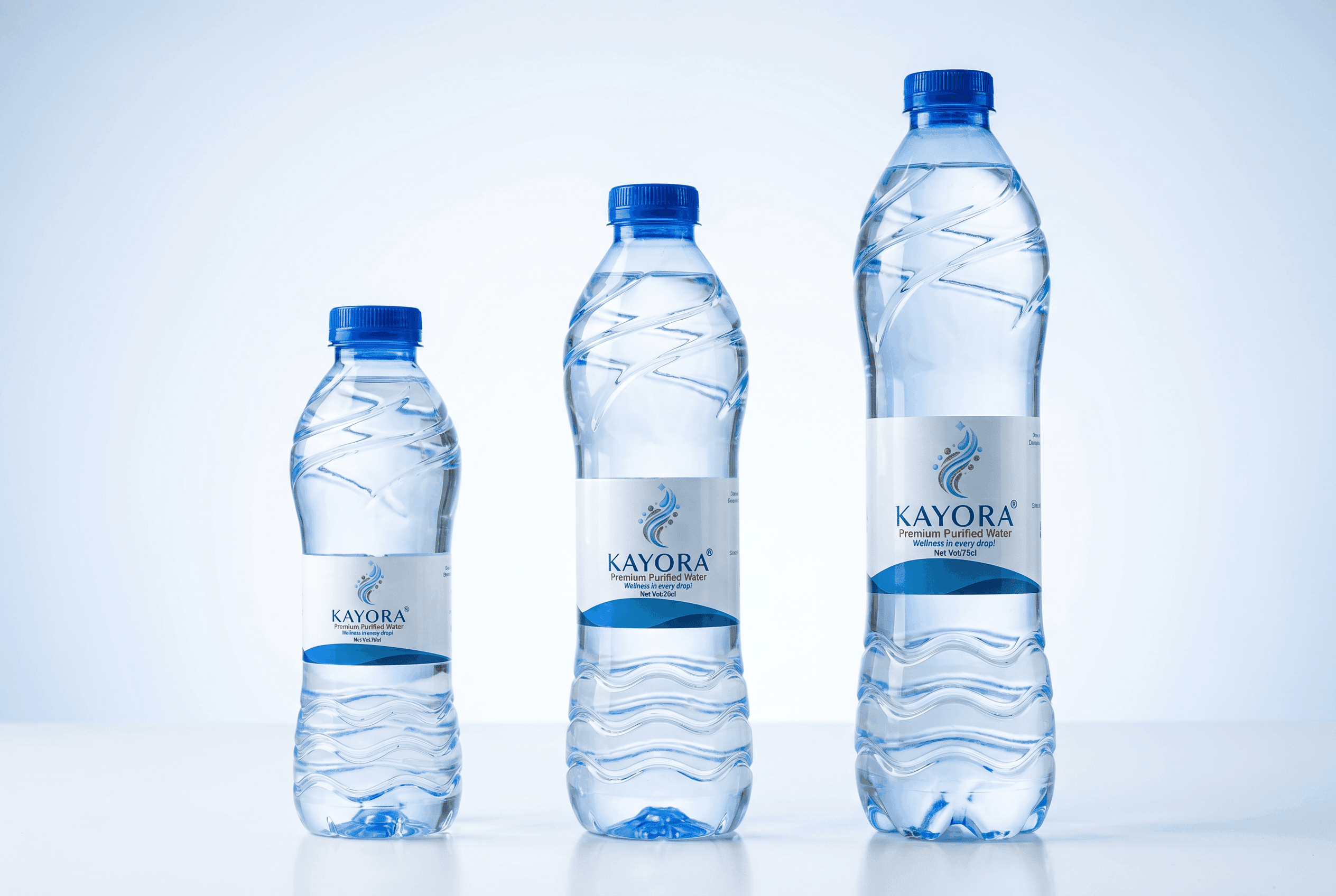 Kayora 30cl, 50cl and 75cl studio shot — premium purified water, produced in Eket, Akwa Ibom